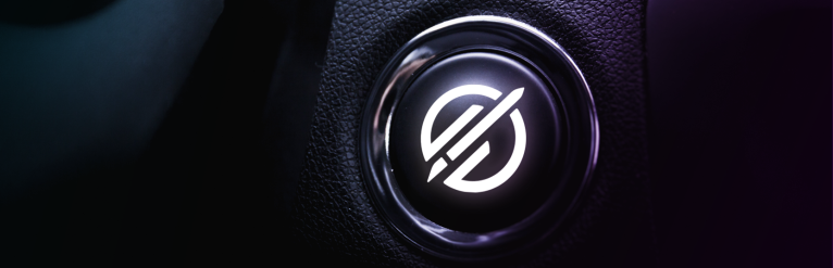 A push-to start ignition button with the Ignite logo